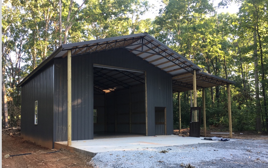 Outdoor pole barn with awning